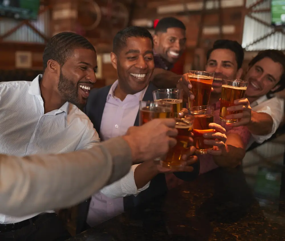 Las Vegas Bachelor Party Strip Clubs guide: A bachelor party group celebrating in Las Vegas